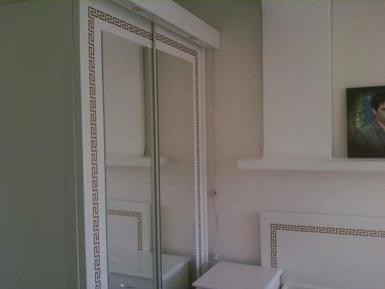 помогите подобрать шторы  в спальню