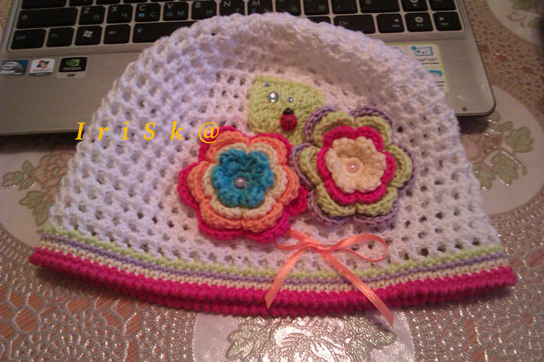 Еще одна шапочка...