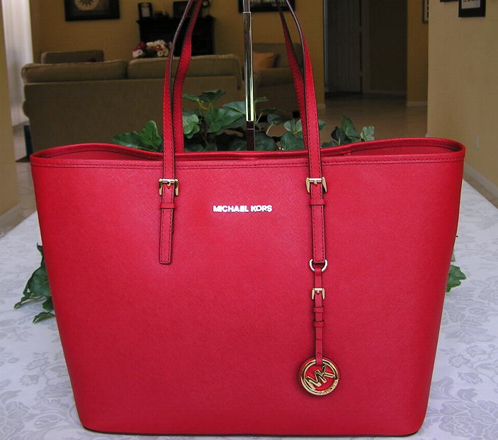 MK red handbag