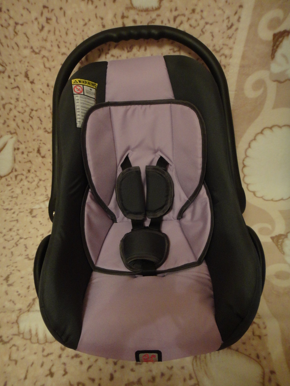 Как уложить малыша в автокресло?!