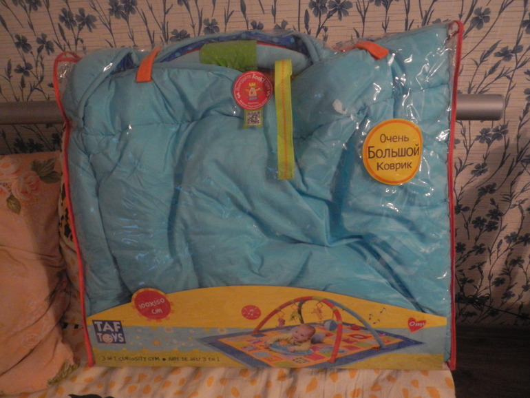 Развивающий коврик Taf Toys и Ходунки в подарок