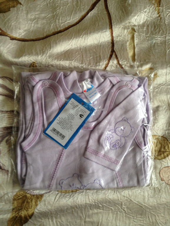 Пристрой польской одежды для новорожденных