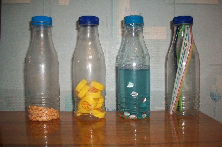 Подушка-развивашка и веселые бутылки