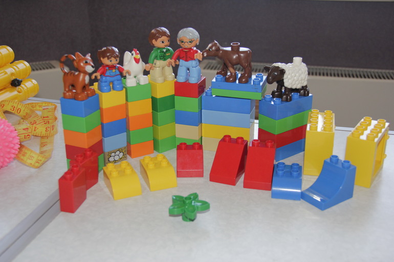 Детские игрушки -фартучки